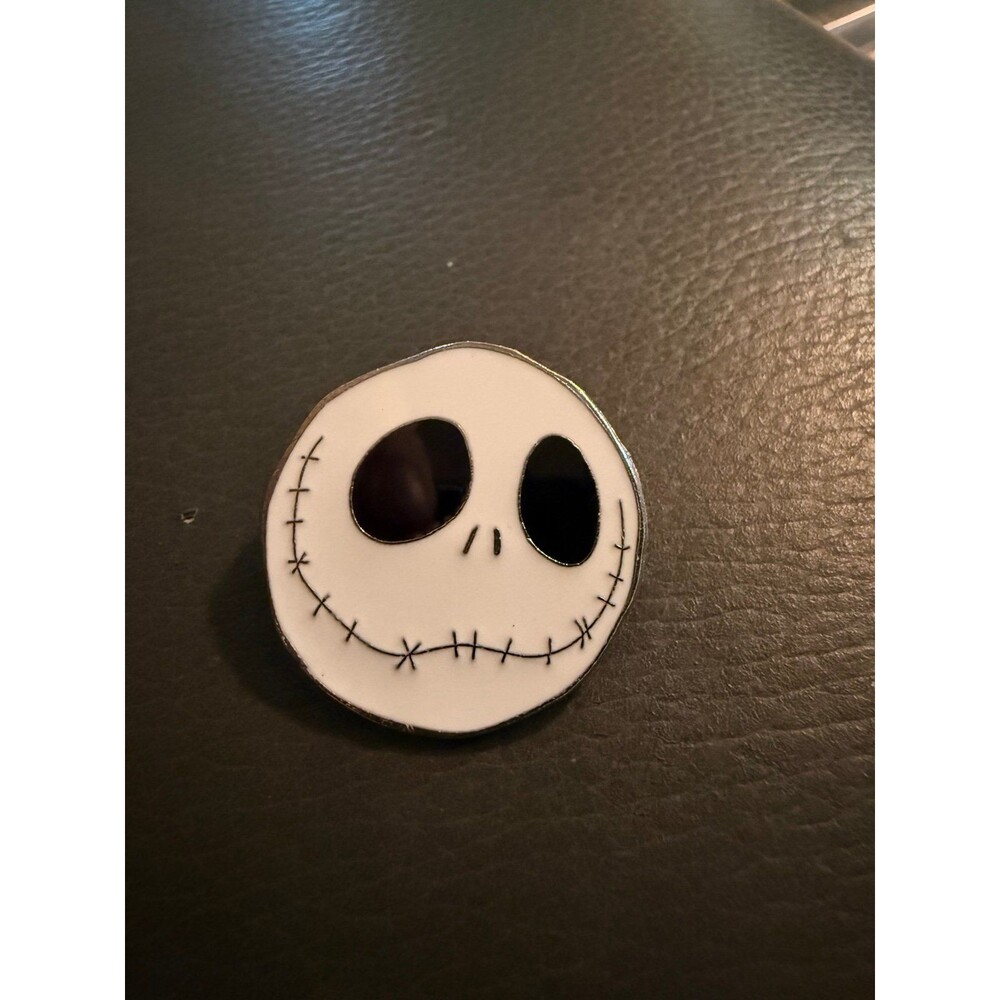 Disney Jack Skellington pin featuring his iconic stitched smiling face